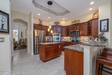 Halifax Plantation Estate home located on a large wooded lot in on Halifax Plantation Golf Club in Florida - for sale on GolfHomes.com, golf home, golf lot