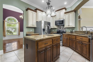 Welcome to this stunning custom-built 4-bedroom, 2.5-bath home on Diamondhead Country Club in Mississippi - for sale on GolfHomes.com, golf home, golf lot