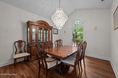 Step into this beautifully updated brick home tucked away in a on Harbour Point Golf Club in North Carolina - for sale on GolfHomes.com, golf home, golf lot
