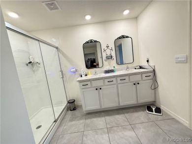 This almost new (built in 2022), beautifully designed 4-bedroom on Twisted Oaks Golf Club in Florida - for sale on GolfHomes.com, golf home, golf lot
