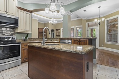 Welcome to this stunning custom-built 4-bedroom, 2.5-bath home on Diamondhead Country Club in Mississippi - for sale on GolfHomes.com, golf home, golf lot