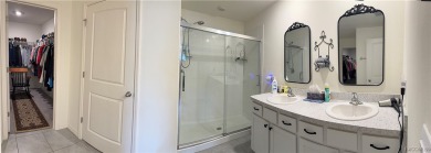 This almost new (built in 2022), beautifully designed 4-bedroom on Twisted Oaks Golf Club in Florida - for sale on GolfHomes.com, golf home, golf lot