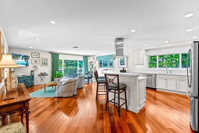 Beautifully renovated 4BR/3BA home located on the 12th hole in on Delray Dunes Golf and Country Club in Florida - for sale on GolfHomes.com, golf home, golf lot