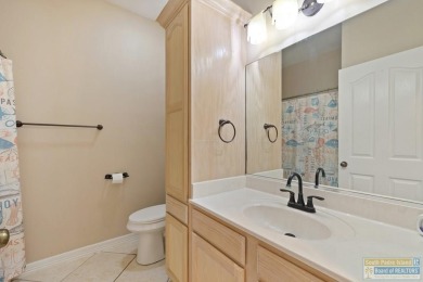 Step into comfort and style in this inviting golf course home on South Padre Island Golf Club in Texas - for sale on GolfHomes.com, golf home, golf lot