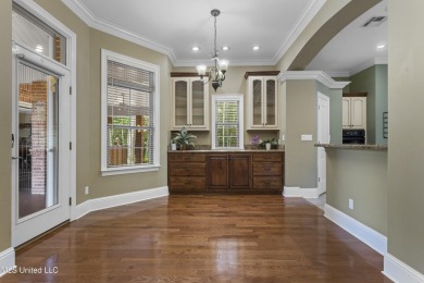 Welcome to this stunning custom-built 4-bedroom, 2.5-bath home on Diamondhead Country Club in Mississippi - for sale on GolfHomes.com, golf home, golf lot