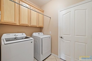 Step into comfort and style in this inviting golf course home on South Padre Island Golf Club in Texas - for sale on GolfHomes.com, golf home, golf lot