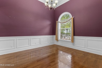 Welcome to this stunning custom-built 4-bedroom, 2.5-bath home on Diamondhead Country Club in Mississippi - for sale on GolfHomes.com, golf home, golf lot