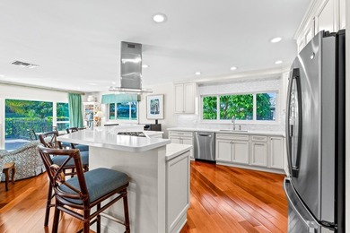 Beautifully renovated 4BR/3BA home located on the 12th hole in on Delray Dunes Golf and Country Club in Florida - for sale on GolfHomes.com, golf home, golf lot