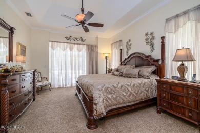Halifax Plantation Estate home located on a large wooded lot in on Halifax Plantation Golf Club in Florida - for sale on GolfHomes.com, golf home, golf lot
