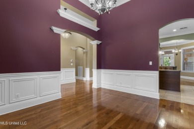 Welcome to this stunning custom-built 4-bedroom, 2.5-bath home on Diamondhead Country Club in Mississippi - for sale on GolfHomes.com, golf home, golf lot
