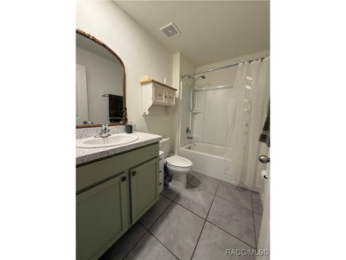 This almost new (built in 2022), beautifully designed 4-bedroom on Twisted Oaks Golf Club in Florida - for sale on GolfHomes.com, golf home, golf lot