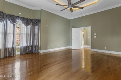 Welcome to this stunning custom-built 4-bedroom, 2.5-bath home on Diamondhead Country Club in Mississippi - for sale on GolfHomes.com, golf home, golf lot