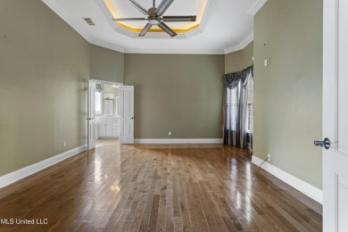 Welcome to this stunning custom-built 4-bedroom, 2.5-bath home on Diamondhead Country Club in Mississippi - for sale on GolfHomes.com, golf home, golf lot