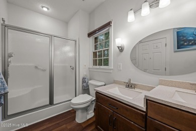 Step into this beautifully updated brick home tucked away in a on Harbour Point Golf Club in North Carolina - for sale on GolfHomes.com, golf home, golf lot