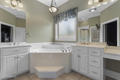 Welcome to this stunning custom-built 4-bedroom, 2.5-bath home on Diamondhead Country Club in Mississippi - for sale on GolfHomes.com, golf home, golf lot