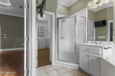 Welcome to this stunning custom-built 4-bedroom, 2.5-bath home on Diamondhead Country Club in Mississippi - for sale on GolfHomes.com, golf home, golf lot