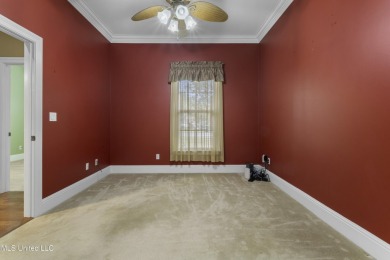 Welcome to this stunning custom-built 4-bedroom, 2.5-bath home on Diamondhead Country Club in Mississippi - for sale on GolfHomes.com, golf home, golf lot