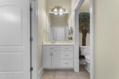Welcome to this stunning custom-built 4-bedroom, 2.5-bath home on Diamondhead Country Club in Mississippi - for sale on GolfHomes.com, golf home, golf lot