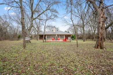 Welcome to this charming 3-bedroom, 2-bathroom home located in on White Bluff Resort - New Course in Texas - for sale on GolfHomes.com, golf home, golf lot