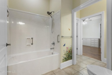 Welcome to this stunning custom-built 4-bedroom, 2.5-bath home on Diamondhead Country Club in Mississippi - for sale on GolfHomes.com, golf home, golf lot