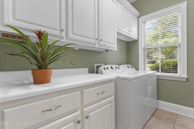 Welcome to this stunning custom-built 4-bedroom, 2.5-bath home on Diamondhead Country Club in Mississippi - for sale on GolfHomes.com, golf home, golf lot
