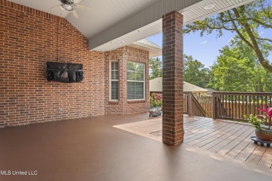 Welcome to this stunning custom-built 4-bedroom, 2.5-bath home on Diamondhead Country Club in Mississippi - for sale on GolfHomes.com, golf home, golf lot