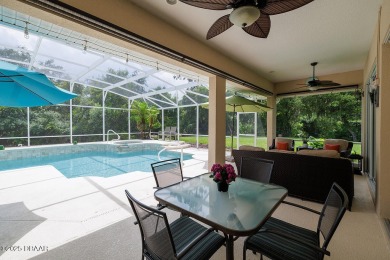 Halifax Plantation Estate home located on a large wooded lot in on Halifax Plantation Golf Club in Florida - for sale on GolfHomes.com, golf home, golf lot