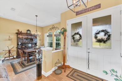 Allow the comforting ambiance of this 2019 Porter Construction on Pinemoor West Golf Club in Florida - for sale on GolfHomes.com, golf home, golf lot