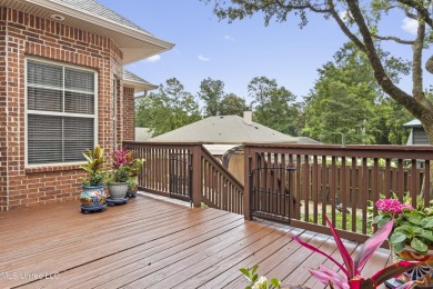 Welcome to this stunning custom-built 4-bedroom, 2.5-bath home on Diamondhead Country Club in Mississippi - for sale on GolfHomes.com, golf home, golf lot