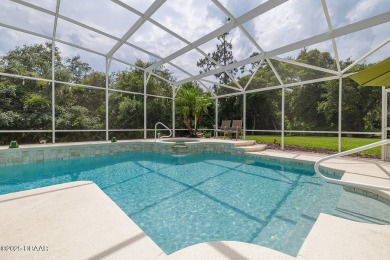 Halifax Plantation Estate home located on a large wooded lot in on Halifax Plantation Golf Club in Florida - for sale on GolfHomes.com, golf home, golf lot