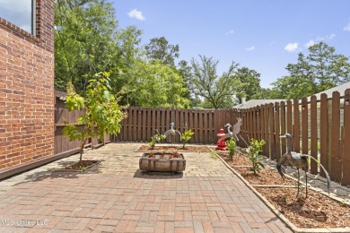 Welcome to this stunning custom-built 4-bedroom, 2.5-bath home on Diamondhead Country Club in Mississippi - for sale on GolfHomes.com, golf home, golf lot