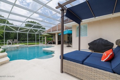 Halifax Plantation Estate home located on a large wooded lot in on Halifax Plantation Golf Club in Florida - for sale on GolfHomes.com, golf home, golf lot