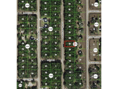 Nice building lot with new construction in the area and located on Citrus Springs Country Club in Florida - for sale on GolfHomes.com, golf home, golf lot