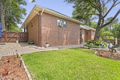 Welcome to this stunning custom-built 4-bedroom, 2.5-bath home on Diamondhead Country Club in Mississippi - for sale on GolfHomes.com, golf home, golf lot