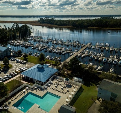 Step into this beautifully updated brick home tucked away in a on Harbour Point Golf Club in North Carolina - for sale on GolfHomes.com, golf home, golf lot