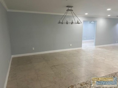 STUNNING 5 bedroom, 4.5 bath open concept with a kitchen that on Harlingen Country Club in Texas - for sale on GolfHomes.com, golf home, golf lot
