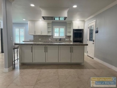 STUNNING 5 bedroom, 4.5 bath open concept with a kitchen that on Harlingen Country Club in Texas - for sale on GolfHomes.com, golf home, golf lot