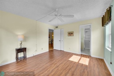 55+ COMMUNITY, THIS TURN KEY READY UNIT IS ON THE 2nd FLOOR on Sunrise Lakes Phase III in Florida - for sale on GolfHomes.com, golf home, golf lot