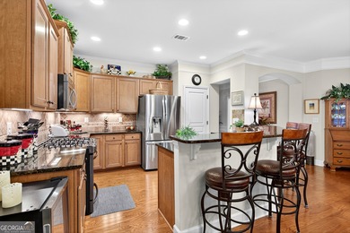 Welcome to this beautifully upgraded ranch home situated on a on Canongate Golf At Sun City Peachtree in Georgia - for sale on GolfHomes.com, golf home, golf lot