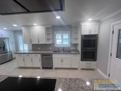 STUNNING 5 bedroom, 4.5 bath open concept with a kitchen that on Harlingen Country Club in Texas - for sale on GolfHomes.com, golf home, golf lot