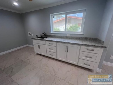 STUNNING 5 bedroom, 4.5 bath open concept with a kitchen that on Harlingen Country Club in Texas - for sale on GolfHomes.com, golf home, golf lot