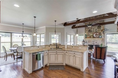 Discover unparalleled luxury at 1776 Traditions Way, an on Traditions of Braselton Golf Club in Georgia - for sale on GolfHomes.com, golf home, golf lot