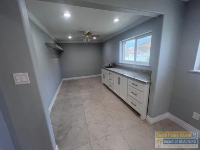 STUNNING 5 bedroom, 4.5 bath open concept with a kitchen that on Harlingen Country Club in Texas - for sale on GolfHomes.com, golf home, golf lot