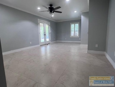 STUNNING 5 bedroom, 4.5 bath open concept with a kitchen that on Harlingen Country Club in Texas - for sale on GolfHomes.com, golf home, golf lot