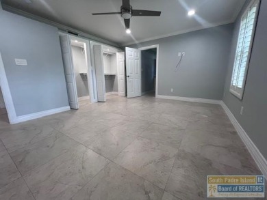 STUNNING 5 bedroom, 4.5 bath open concept with a kitchen that on Harlingen Country Club in Texas - for sale on GolfHomes.com, golf home, golf lot