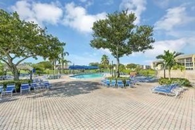 55+ COMMUNITY, THIS TURN KEY READY UNIT IS ON THE 2nd FLOOR on Sunrise Lakes Phase III in Florida - for sale on GolfHomes.com, golf home, golf lot
