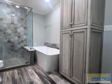 STUNNING 5 bedroom, 4.5 bath open concept with a kitchen that on Harlingen Country Club in Texas - for sale on GolfHomes.com, golf home, golf lot