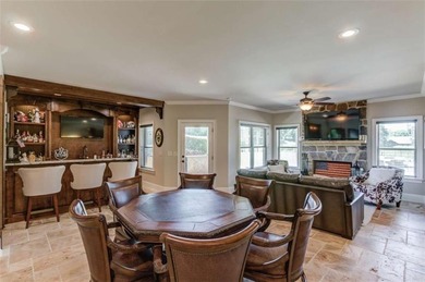 Discover unparalleled luxury at 1776 Traditions Way, an on Traditions of Braselton Golf Club in Georgia - for sale on GolfHomes.com, golf home, golf lot