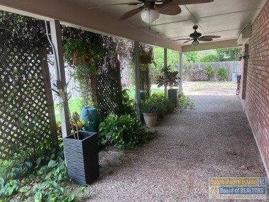 STUNNING 5 bedroom, 4.5 bath open concept with a kitchen that on Harlingen Country Club in Texas - for sale on GolfHomes.com, golf home, golf lot