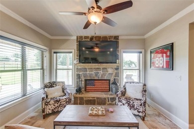 Discover unparalleled luxury at 1776 Traditions Way, an on Traditions of Braselton Golf Club in Georgia - for sale on GolfHomes.com, golf home, golf lot